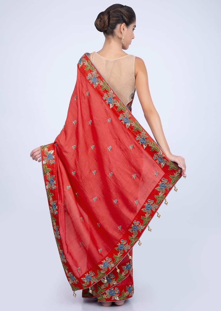 Coral red dupion silk saree with floral resham embroidered butti and border only on kalki