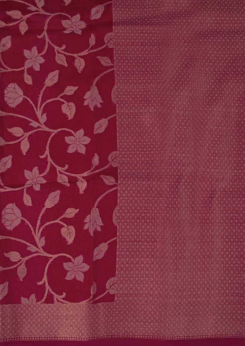 Coral red tussar silk saree with weaved work in floral motif 