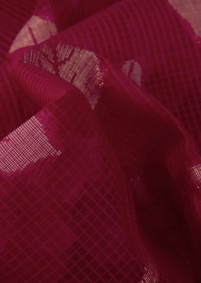 Coral red tussar silk saree with weaved work in floral motif 