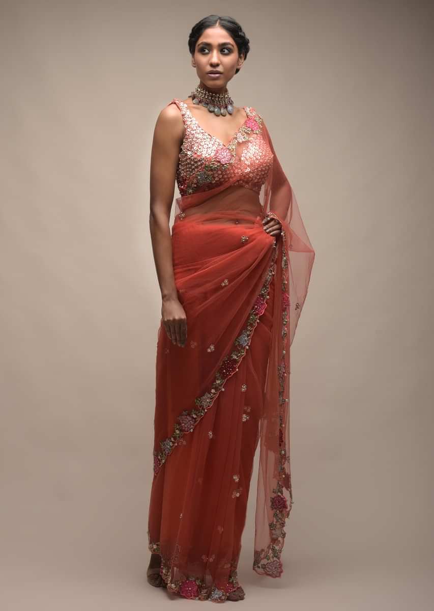 Coral Saree In Net With Resham Embroidered Flowers On The Border And Sequin Buttis