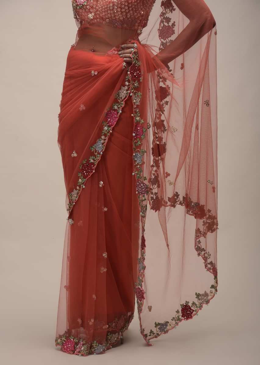 Coral Saree In Net With Resham Embroidered Flowers On The Border And Sequin Buttis