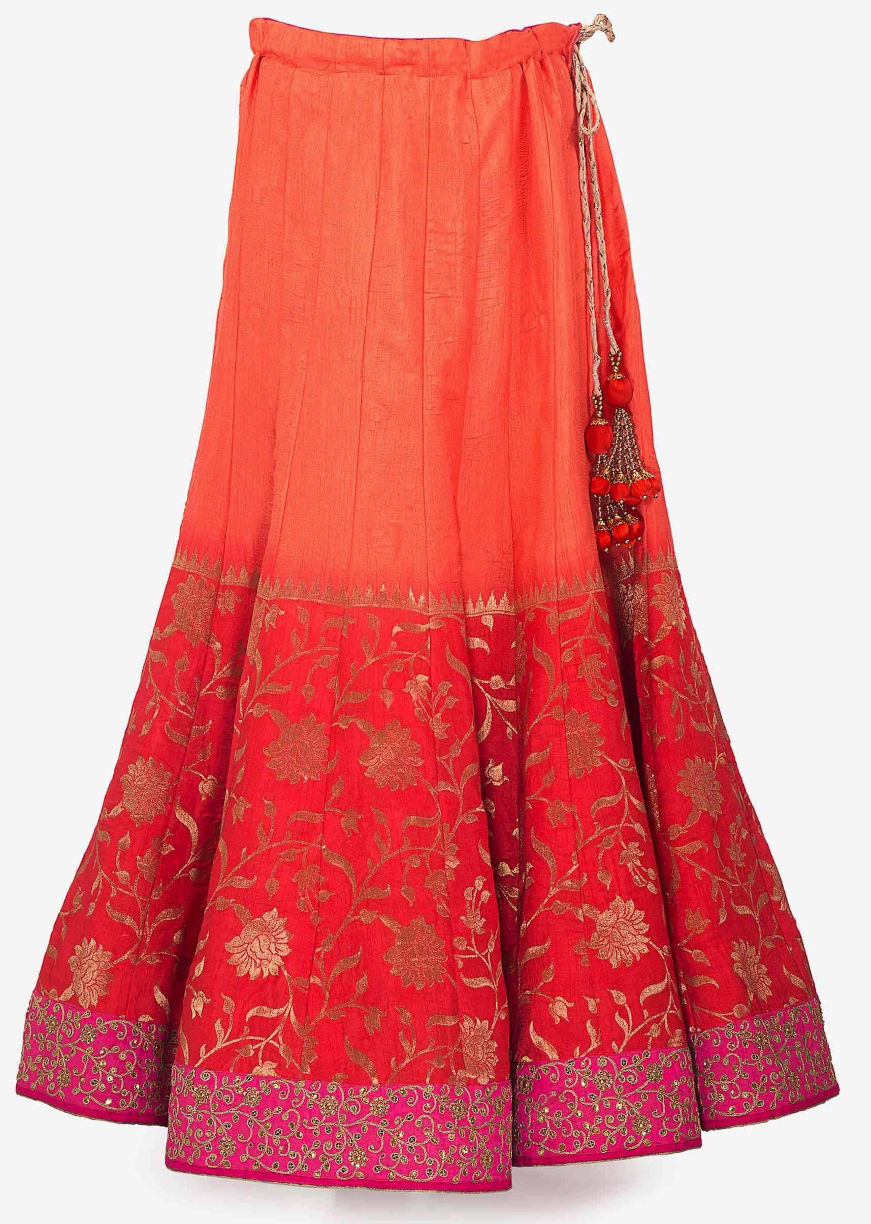 Coral and peach shaded lehenga matched with ready blouse only on Kalki
