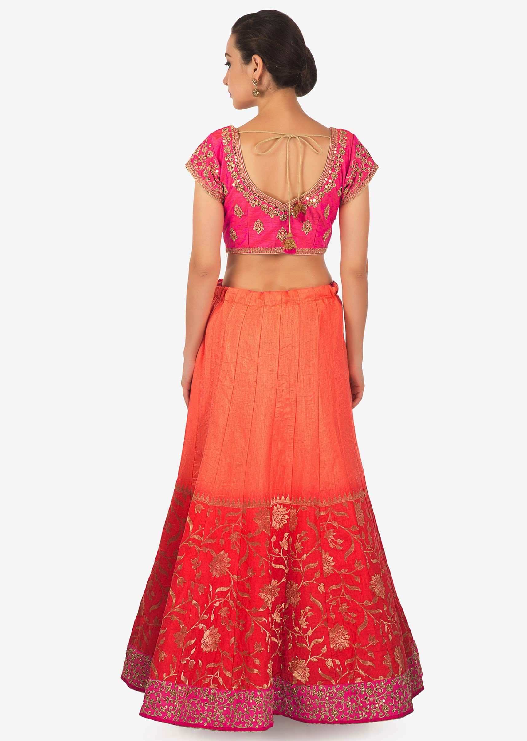 Coral and peach shaded lehenga matched with ready blouse only on Kalki