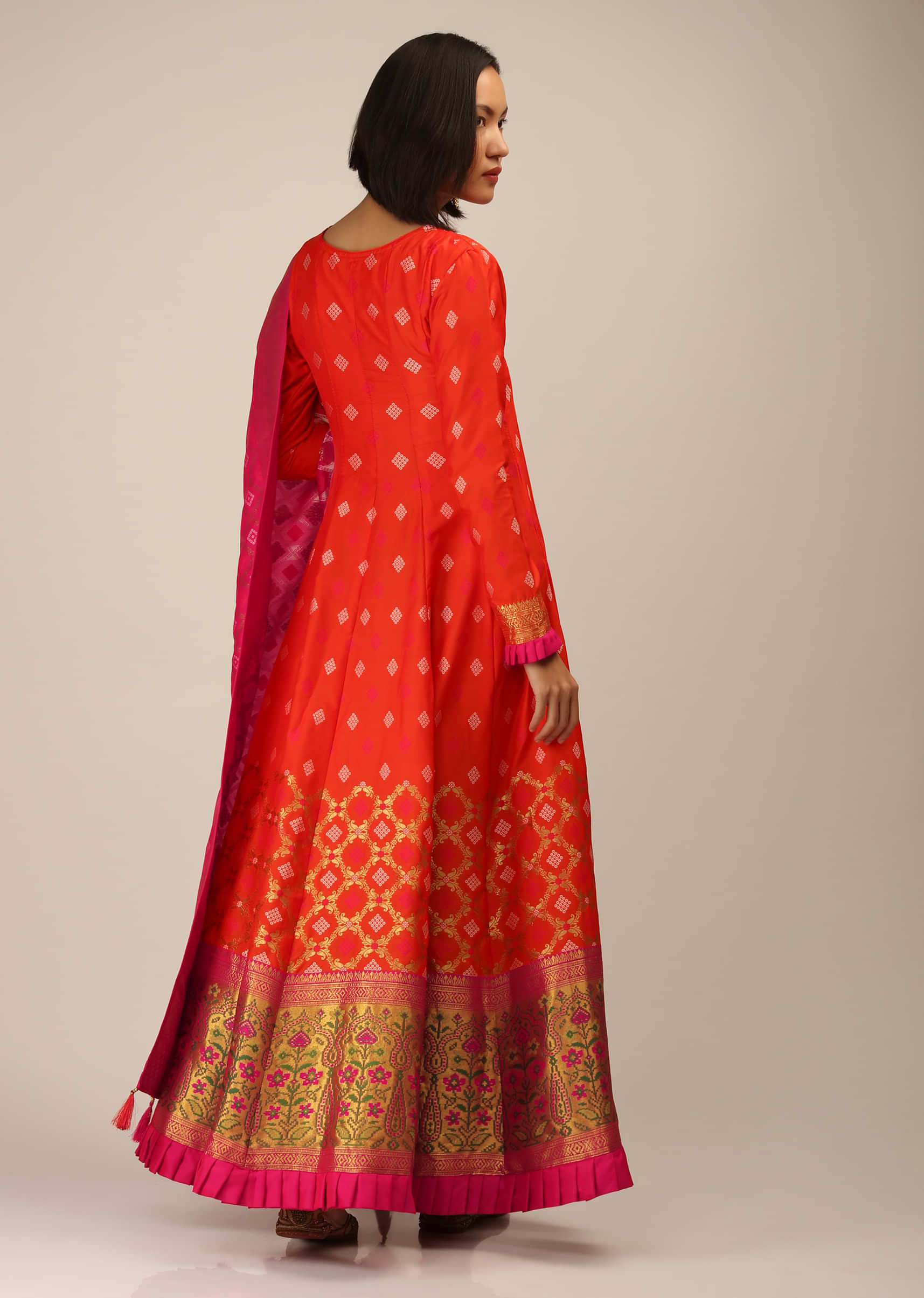 Coral Anarkali Suit In Brocade Silk With Woven Buttis And Zardosi Embroidery