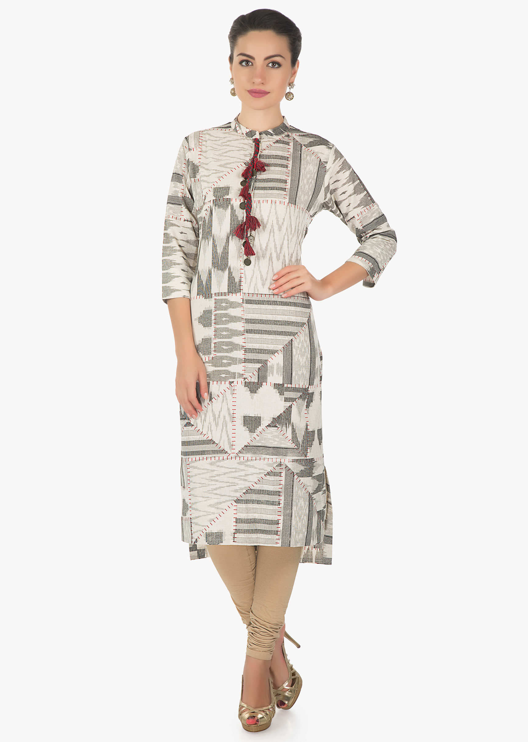 Cream and black kurti featuring with fancy tassel on placket only on Kalki