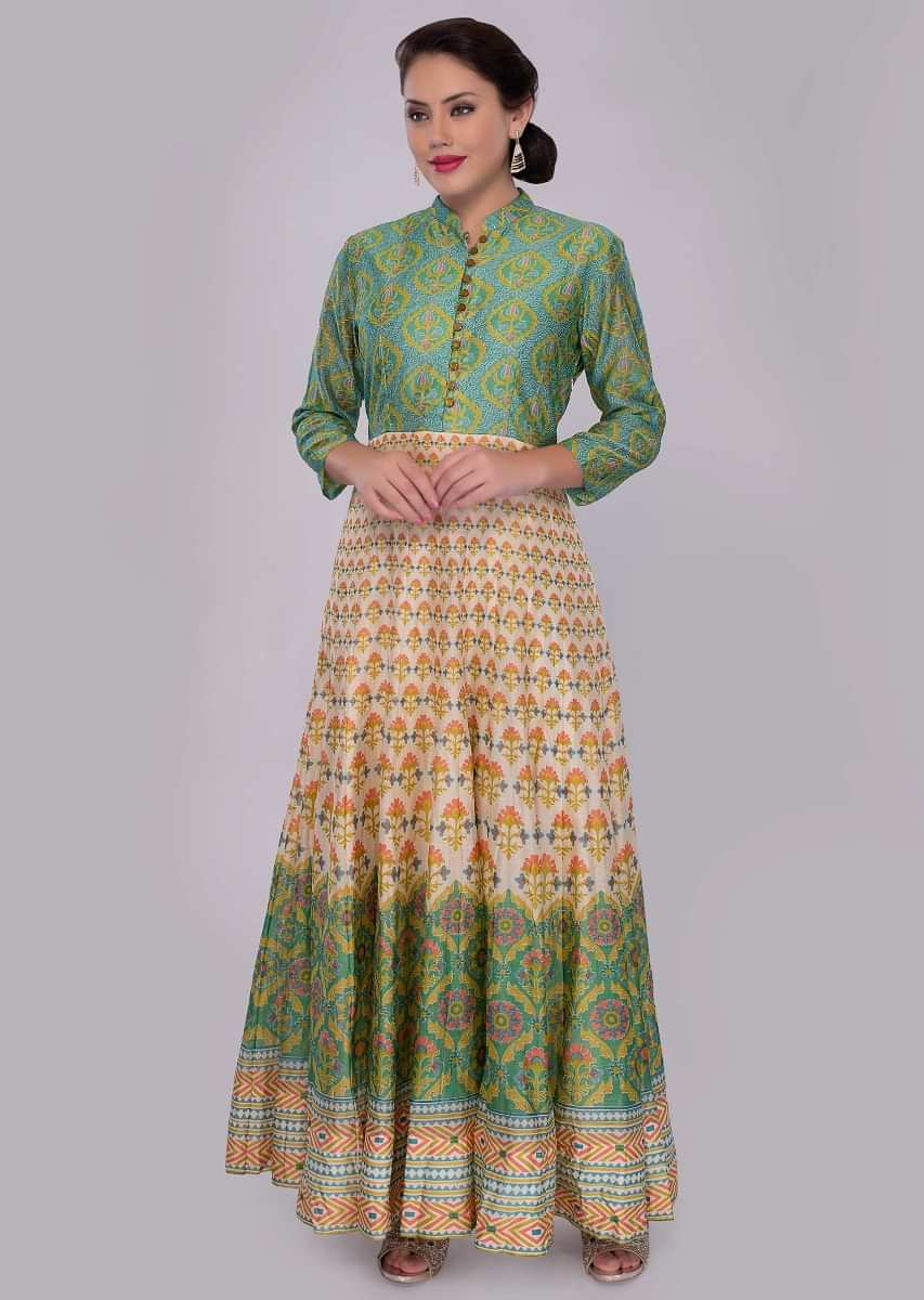 Cream and green shade cotton tunic dress with printed butti 