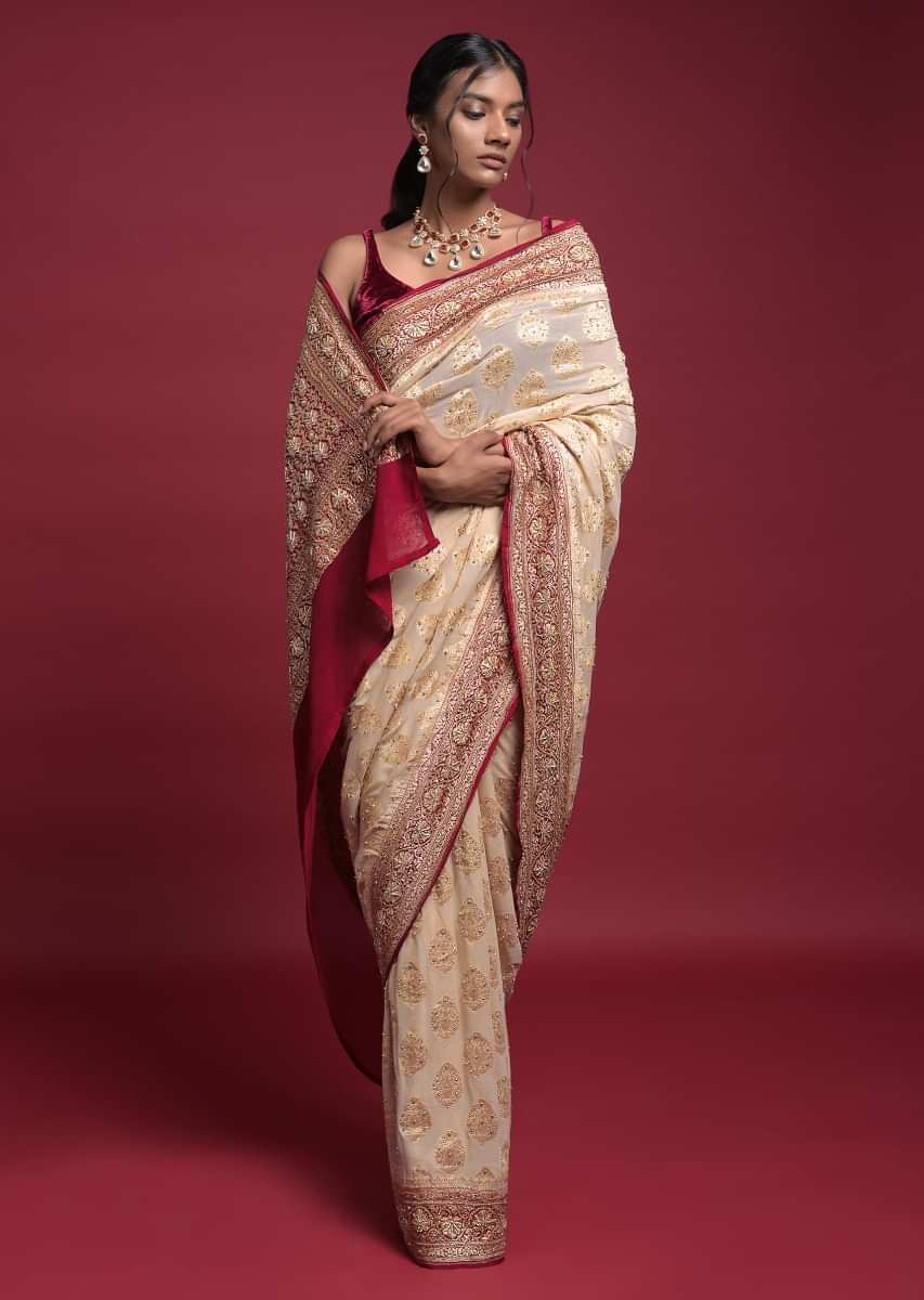 Cream Beige Saree In Georgette With Weaved Leaf Buttis And Maroon Weaved Pallu And Border  