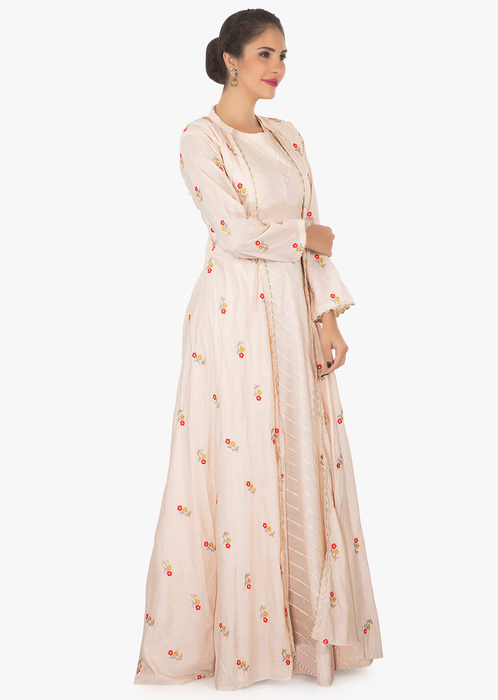 Cream cotton dress matched with a resham embroidery floral motifs jacket only on kalki