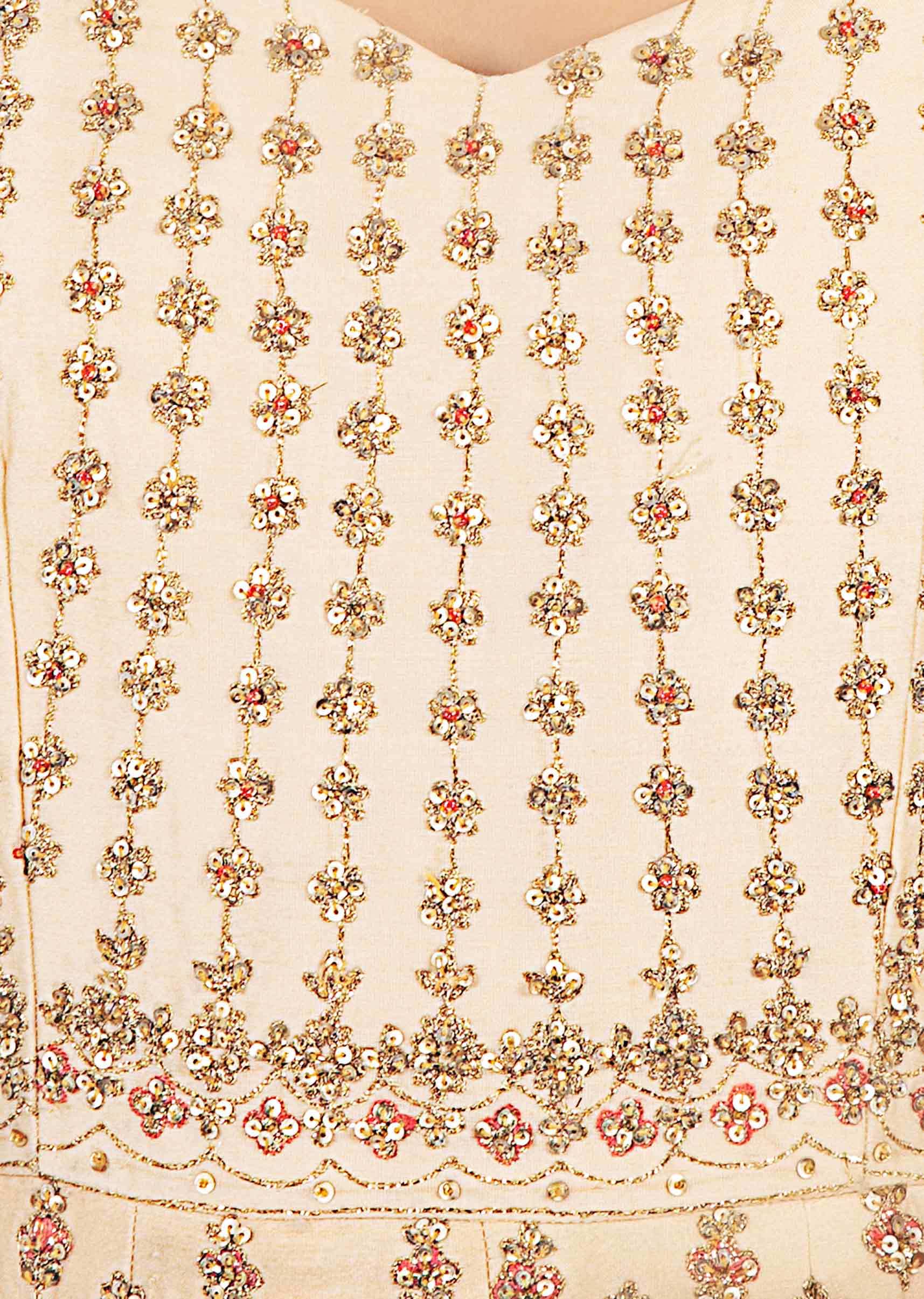 Cream cotton embellished anarkali with a matching net dupatta 