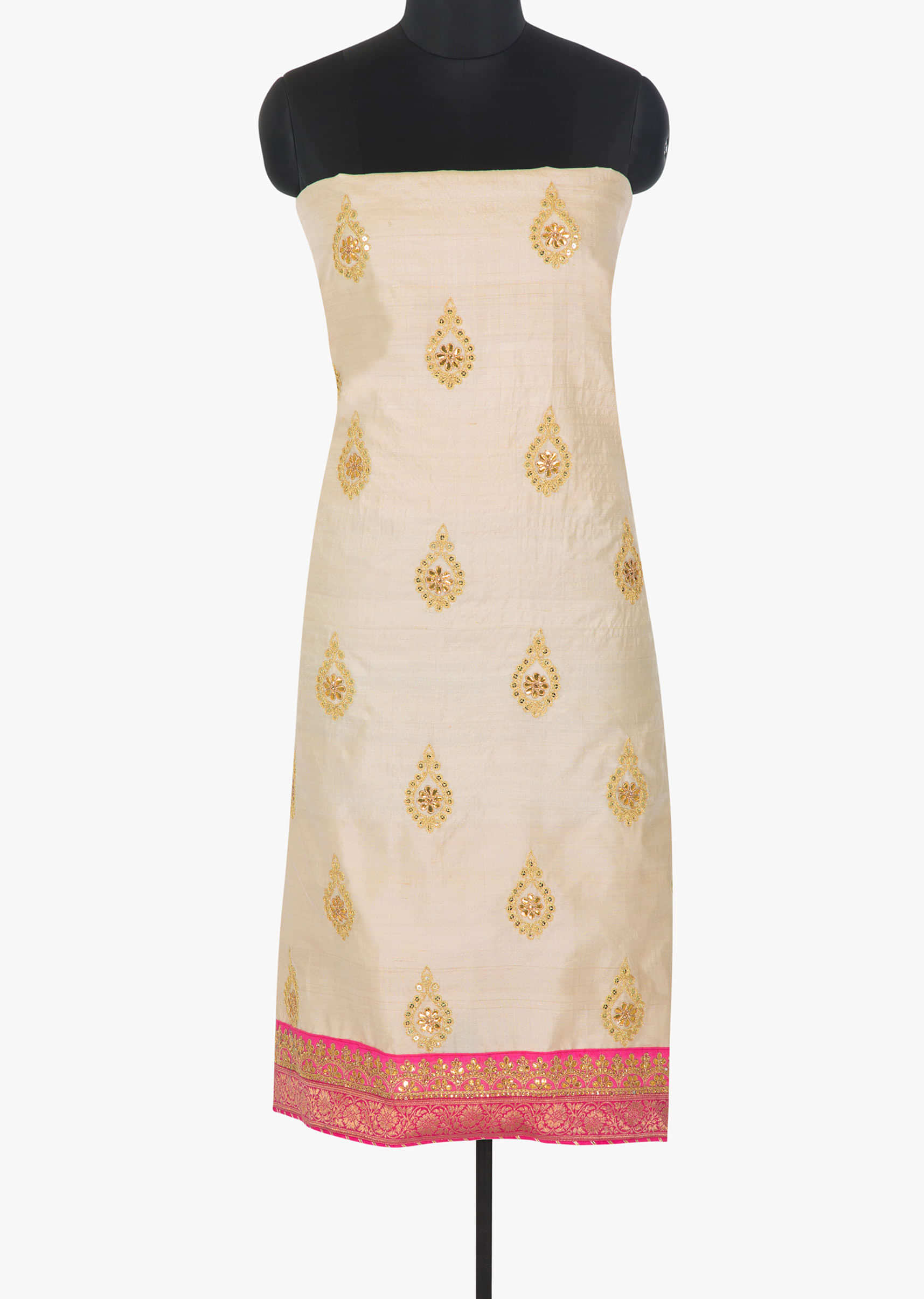 Cream cotton silk unstitched suit in gotta patch,sequin and a brocade hemline only on Kalki