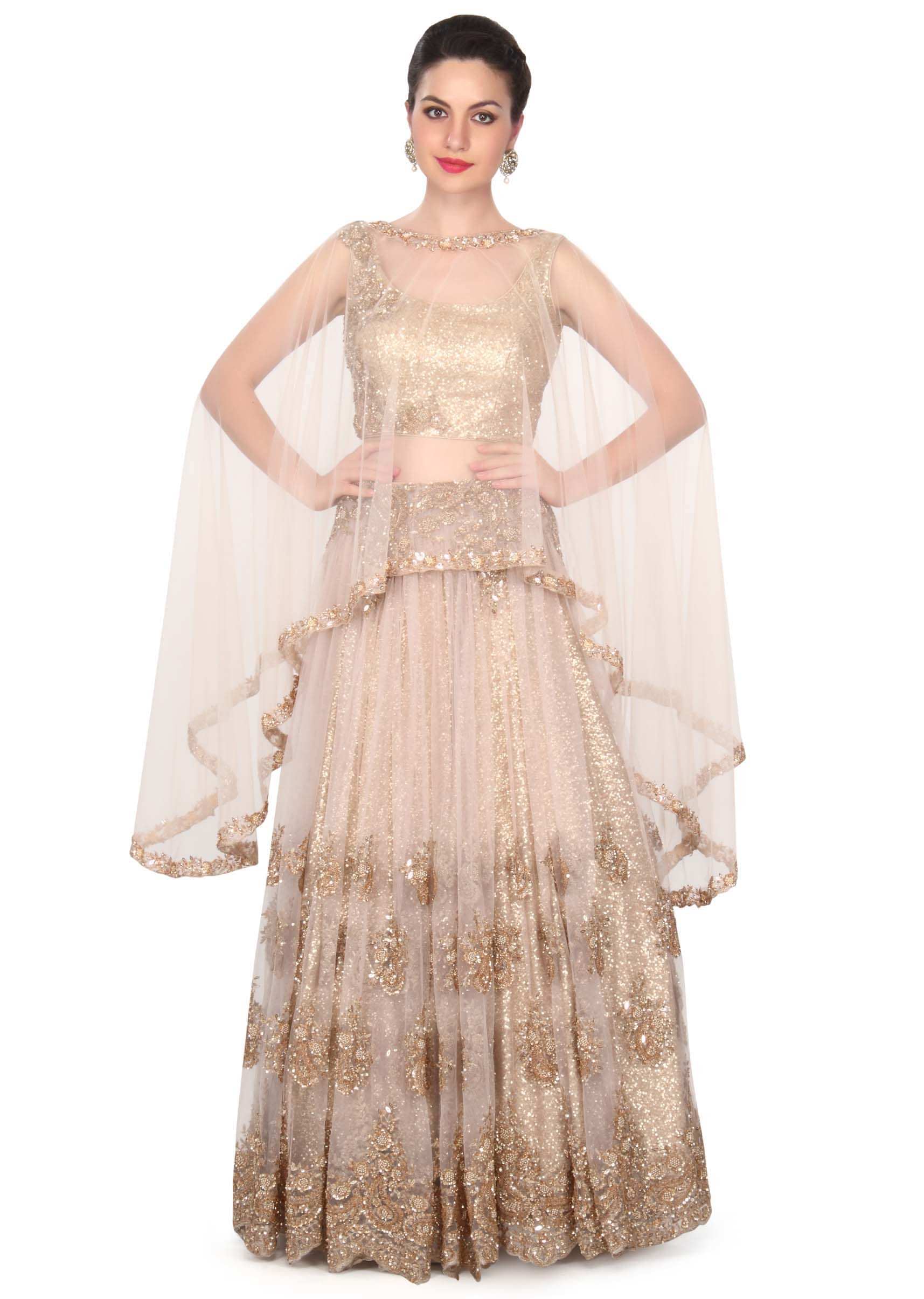 Cream embroidered lehenga matched with cape only on Kalki
