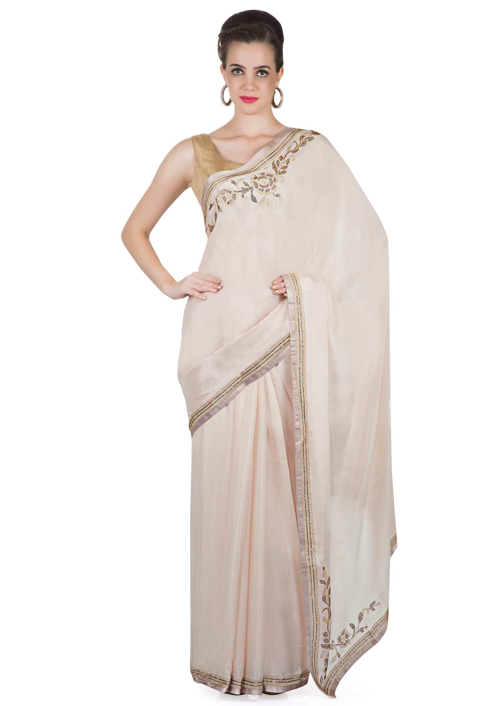 Cream Georgette Saree and Blouse Studded with Kundan Only on Kalki