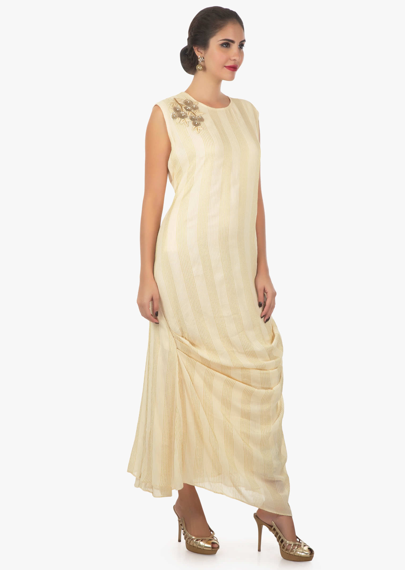 Cream georgette tunic with side pleats and thread work with embroidered patch