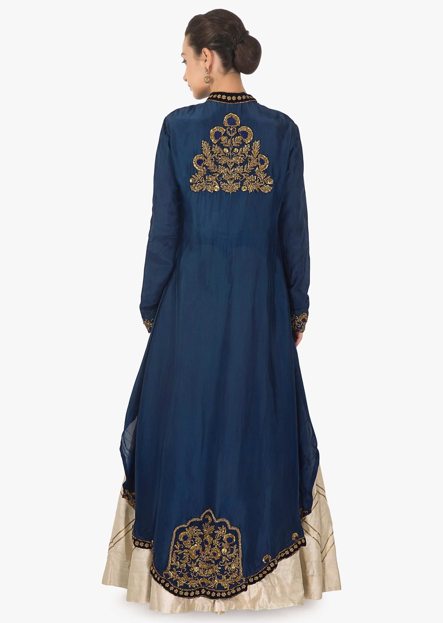 Cream lehenga and blouse in raw silk with navy blue jacket adorn in tassel only on Kalki
