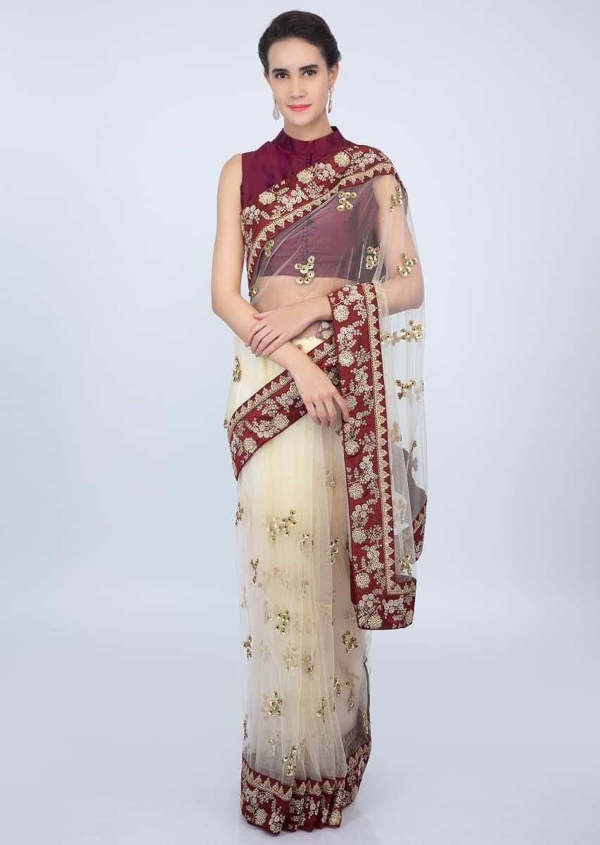 Cream Saree In Sheer Embroidered Net With Contrasting Wine Raw Silk Border Online - Kalki Fashion