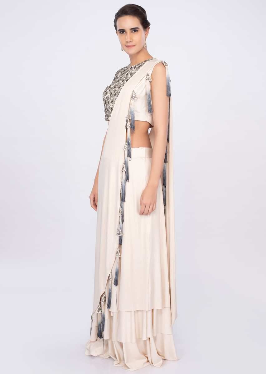Cream Skirt In Shimmer Lycra With Matching Blouse And Prestitched Dupatta Online - Kalki Fashion