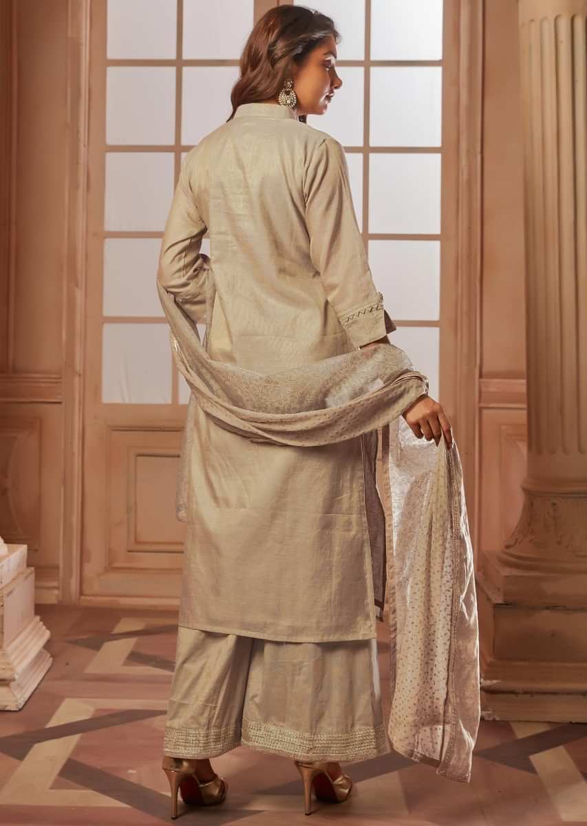 Cream Straight Palazzo Suit In Silk With Embroidered Butti And Fancy Buttons Online - Kalki Fashion