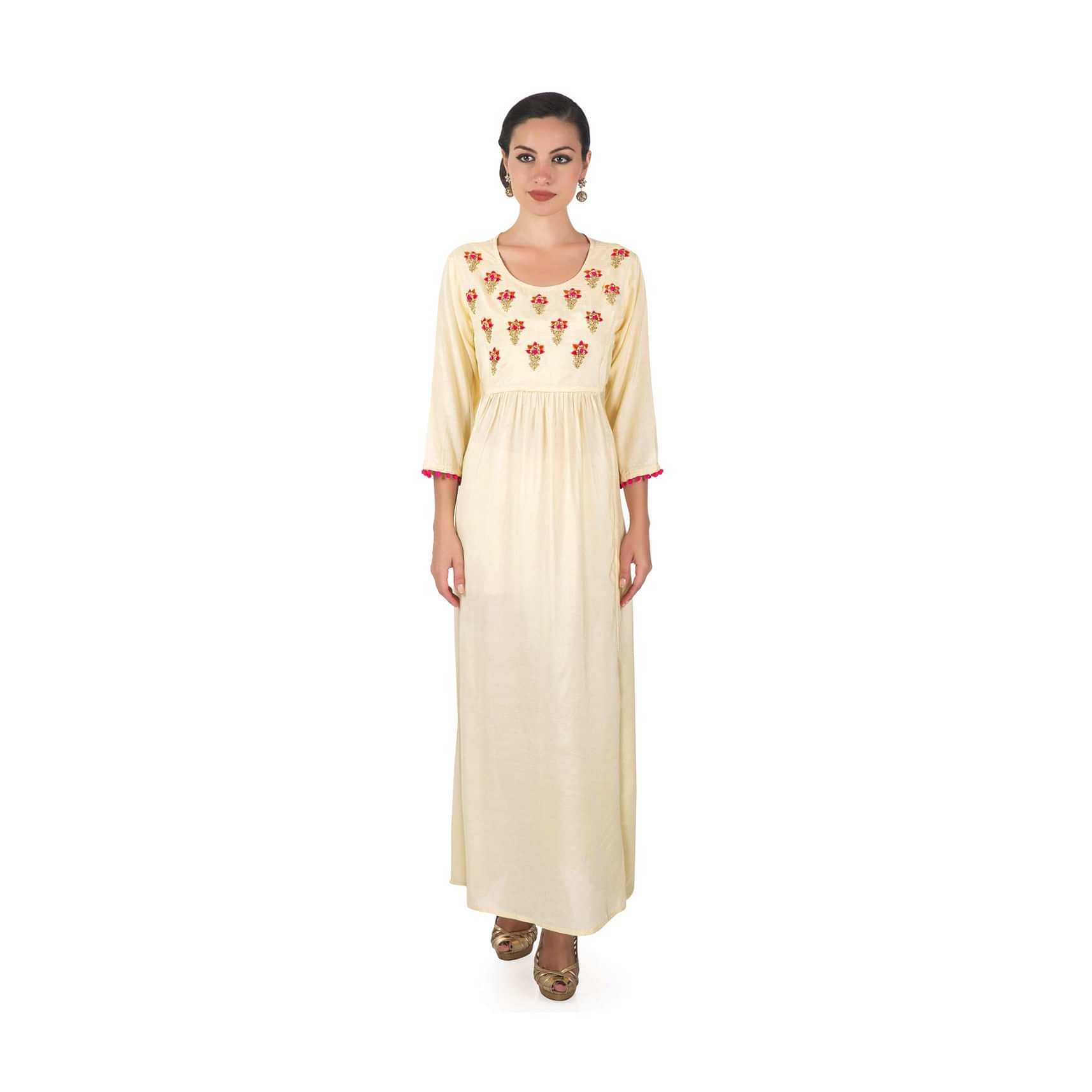 Cream dress adorn in embroidered butti and gathers only on Kalki