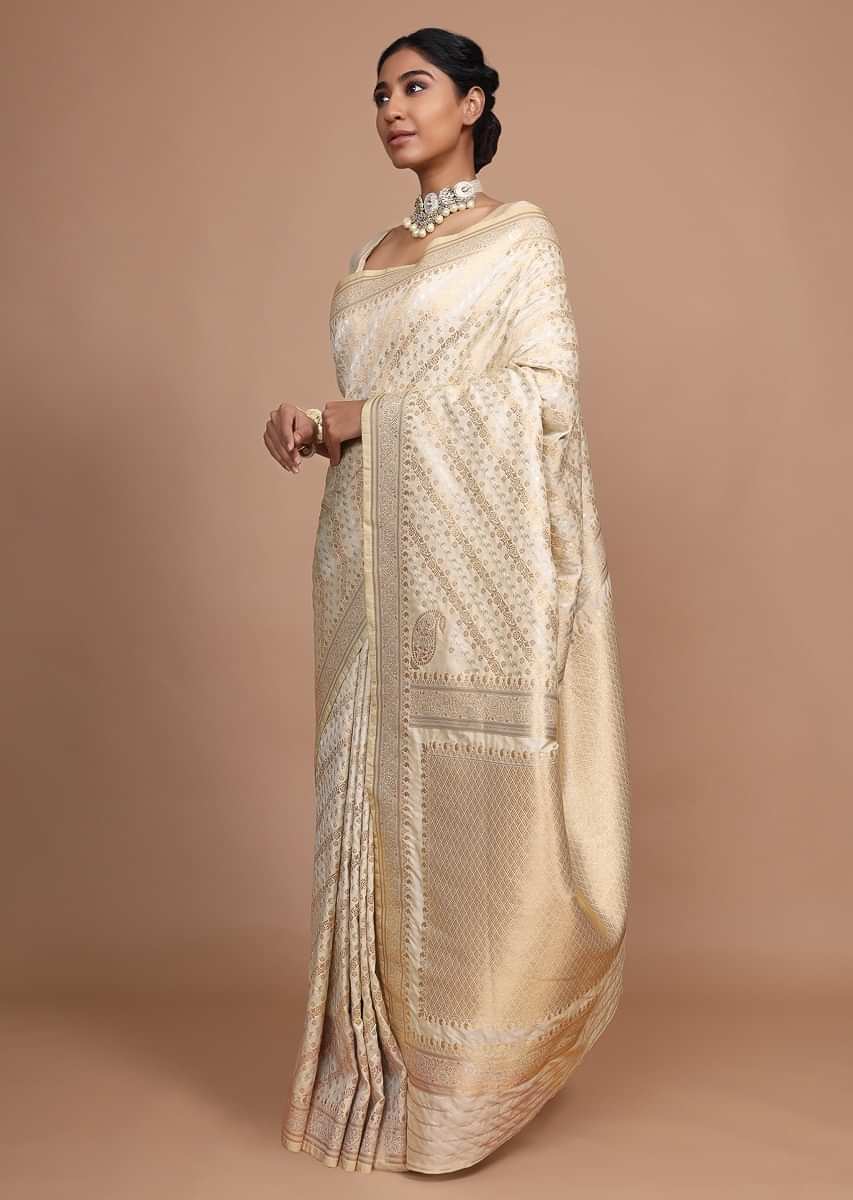 Cream Beige art handloom Saree In Silk With Weaved Floral Design In Diagonal Pattern
