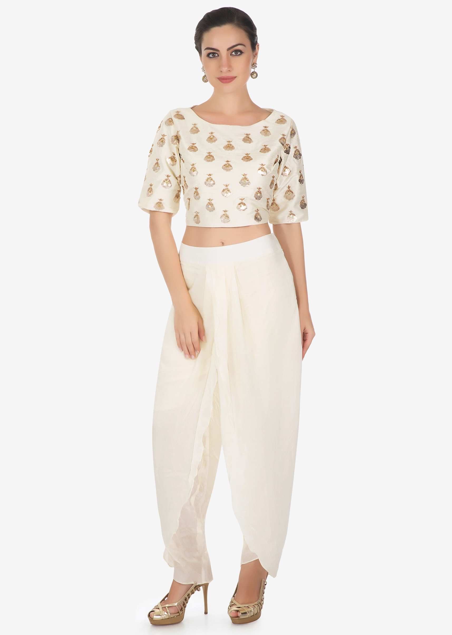 Cream dhoti pants matched with crop top blouse in gotta patch butti only on Kalki