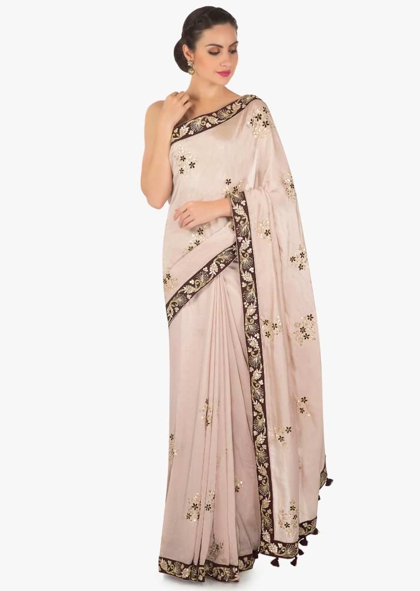 Cream peach saree in silk with gotta patch and resham embroidered butti only on Kalki