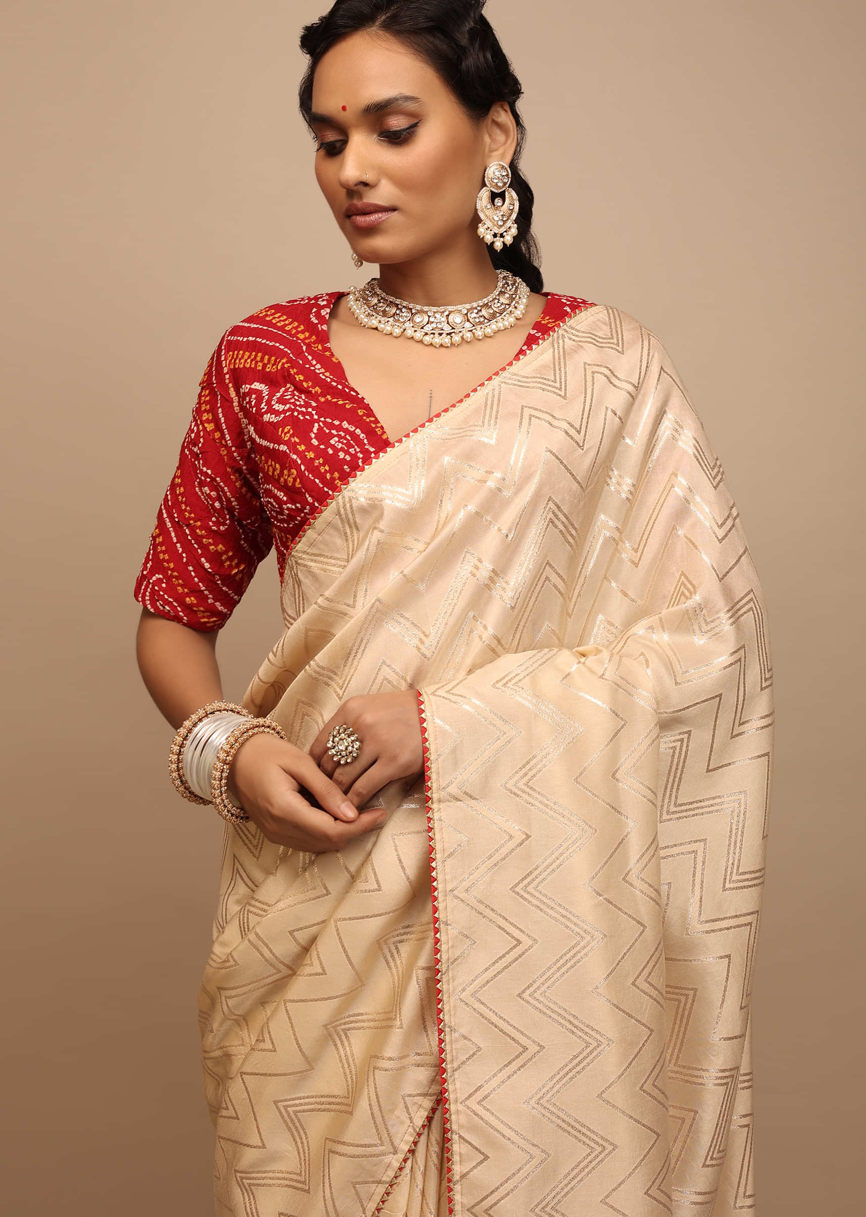 Cream Saree In Silk With Lurex Woven Chevron Design And Thin Border Along With Unstitched Blouse  