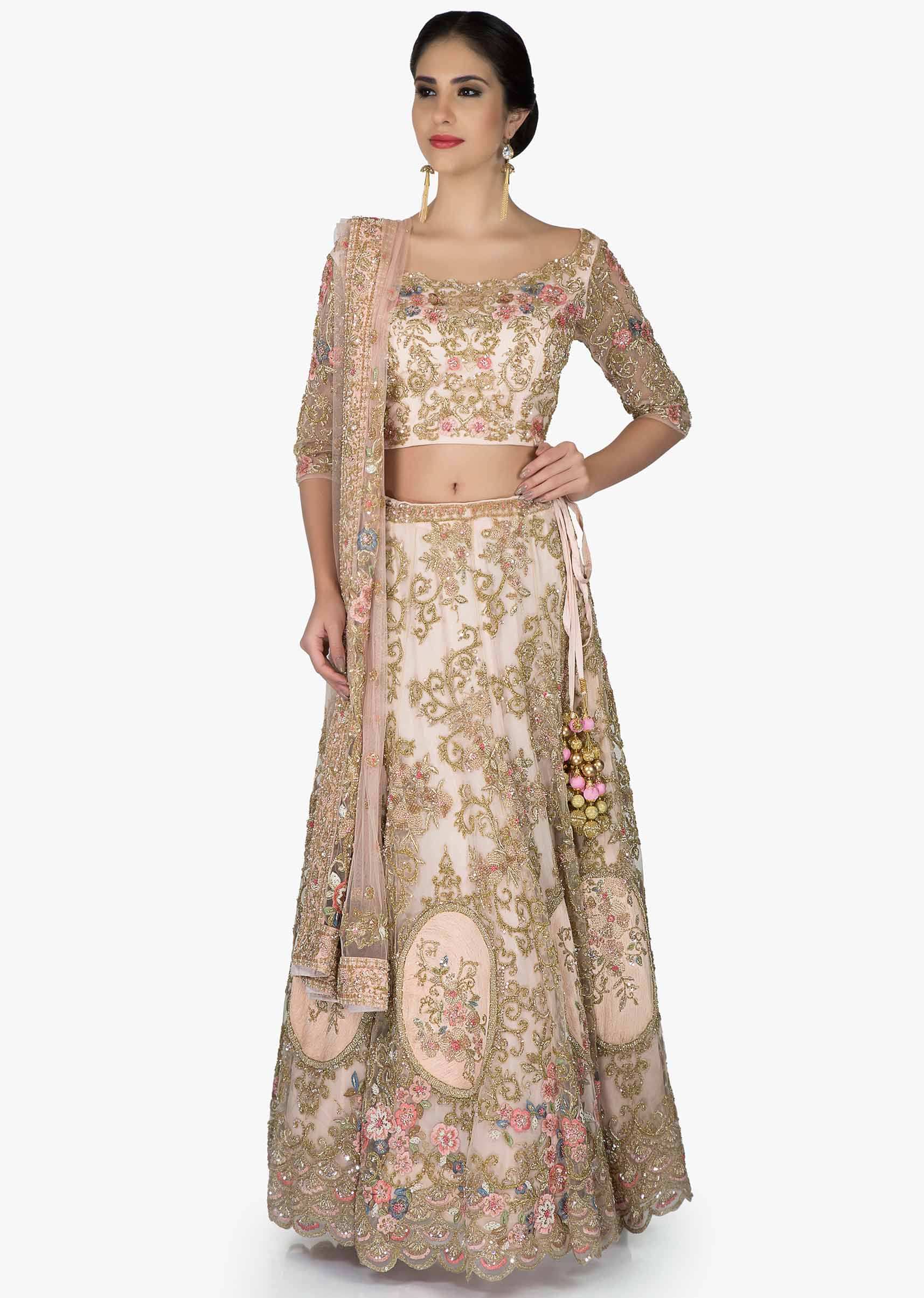 Cream Silk Lehenga Blouse Ensemble Crafted with Floral Embroidered Motifs only on Kalki