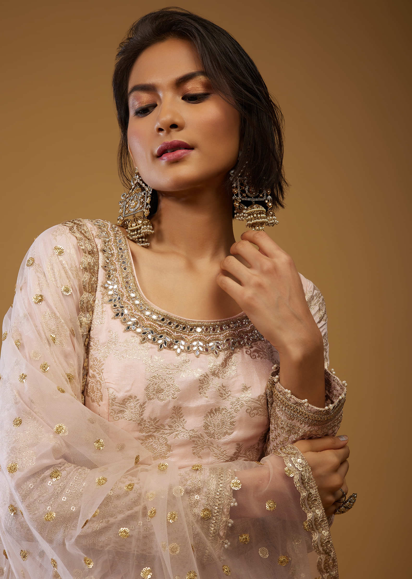 Cream White Anarkali Suit With Floral Brocade Weave And Mirror Embroidery
