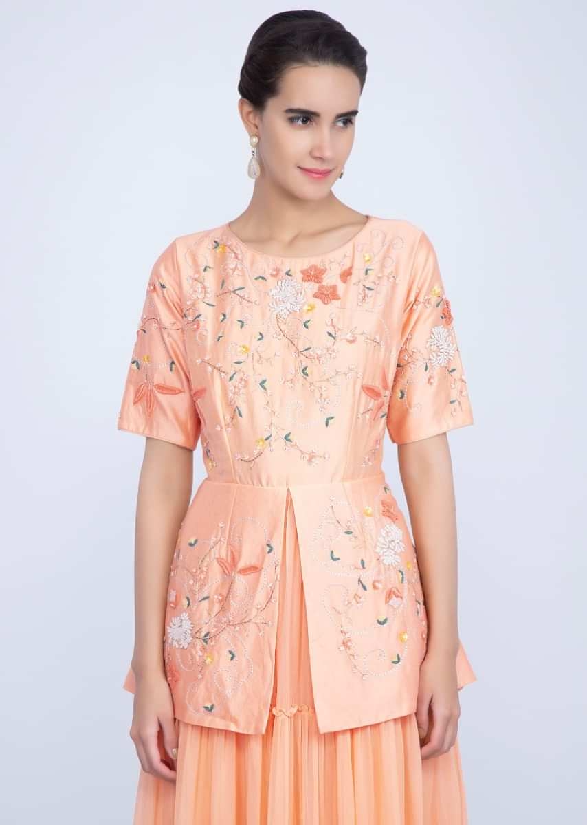 Creamish peach fancy suit with peplum style embroidered bodice only on Kalki
