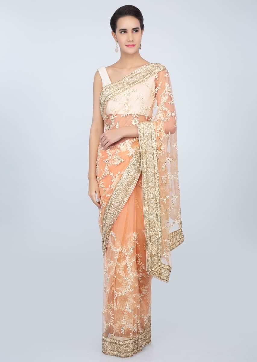 Creamish Peach Saree In Sheer Net With White Thread Embroidered Jaal Work Online - Kalki Fashion