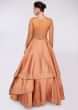 Apricot brown ballroom gown with multiple layers in net  and crepe