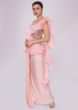 Baby pink lycra saree with draped pleats and ruffled organza pallo 