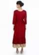 Beige cotton tunic dress matched with a brick red jacket with gathers 