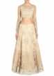Beige shade lehenga adorn in embroidered net only on Kalki
