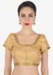Beige brocade blouse highlighted in gold lace only on Kalki