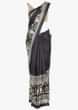 Black cotton silk saree in tribal print