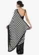 Black and white satin silk saree with unstitched blouse