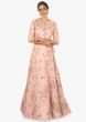 Blush pink raw silk lehenga with a matching blouse and a jacket only on Kalki