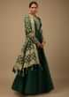 Bottle Green Anarkali Suit In Raw Silk With Hand Embroidery And A Brocade Dupatta Enhanced With Bandhani 