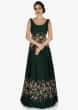 Bottle green raw silk gown with flower embroidery only on Kalki 