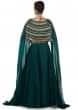 Bottle green Skirt and Blouse with Organza Cape Featuring Tassels Only on Kalki