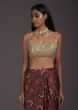 Brick Red Saree In Satin With Floral Print And A Contrasting Cream Sequins Blouse  