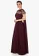 Burgundy drape gown with fancy cape embellished in zardosi and moti work only on Kalki