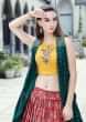 Cherry Red Lehenga In Ikkat Motif Print Matched With Yellow Crop Top Blouse And Rama Green Jacket
