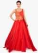 Coral peach net skirt paired with long peach georgette top 