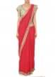 Coral pink saree matched with embroidered blouse only on Kalki