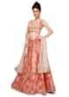 Coral lehenga featuring with gold zari embroidery only on Kalki