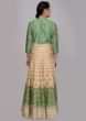 Cream and green shade cotton tunic dress with printed butti 