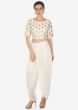 Cream dhoti pants matched with crop top blouse in gotta patch butti only on Kalki