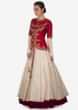 Cream lehenga matched with red raw silk embroidered jacket blouse only on Kalki
